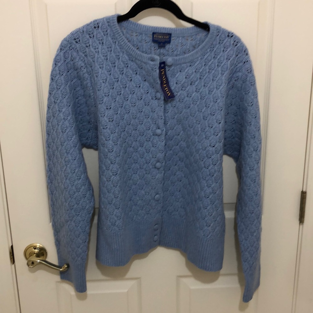 Heirloom lambs wool sweater. Sky blue. Slightly cropped length.